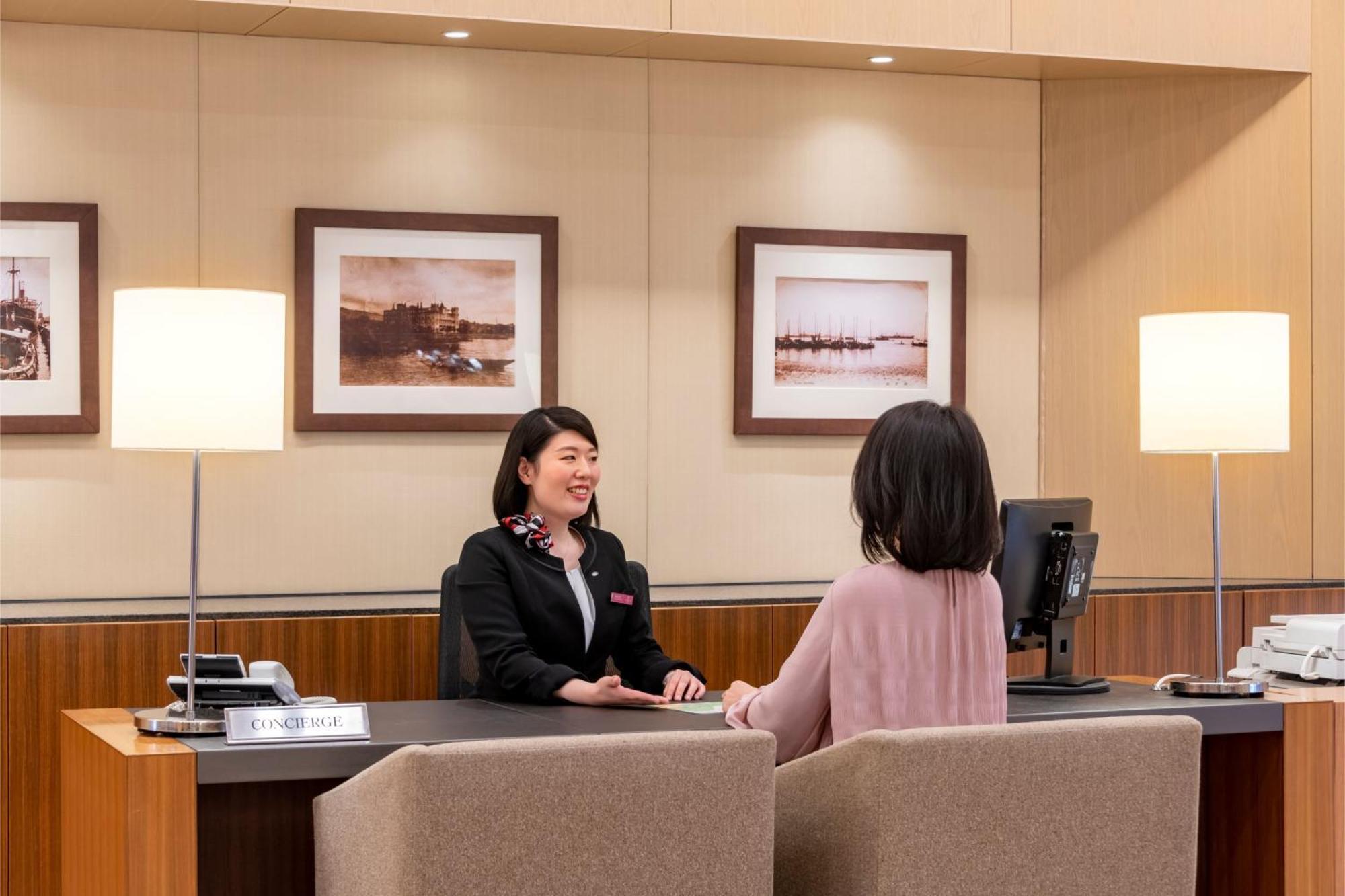 Ana Crowne Plaza Kobe By Ihg Hotel Exterior photo A bank teller at work